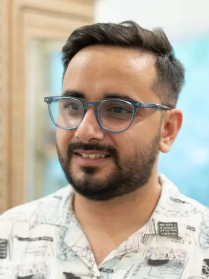 The final result of a great haircut is confidence. This client is looking sharp and refreshed after a precision cut and styling session, ready to take on the day.