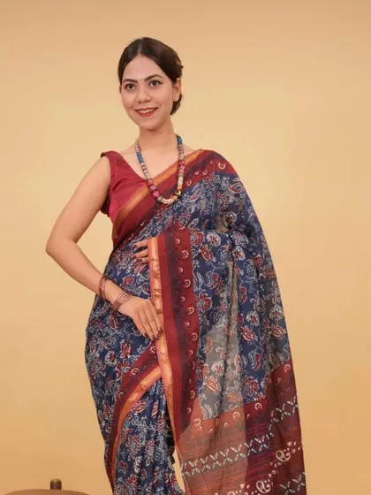 A beautiful blue and red floral block-printed 1-minute saree. The combination of colors and patterns makes this a cheerful and stylish option that is incredibly easy to wear.