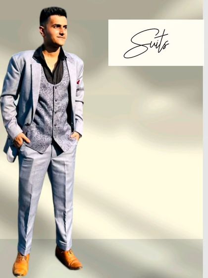 Our client makes a statement in this sharp grey three-piece suit paired with a black shirt. A modern and stylish choice for any formal event.