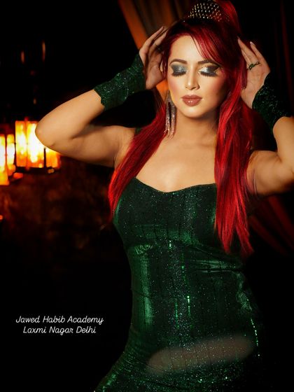 This image captures the fierce attitude of a high-fashion look. We teach students how to create makeup that tells a story and conveys a specific mood.