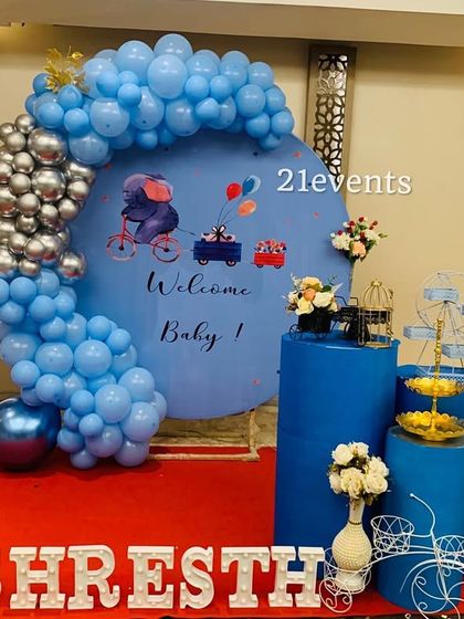 A 'Welcome Baby' setup in shades of blue and silver, perfect for a baby boy shower or naming ceremony.
