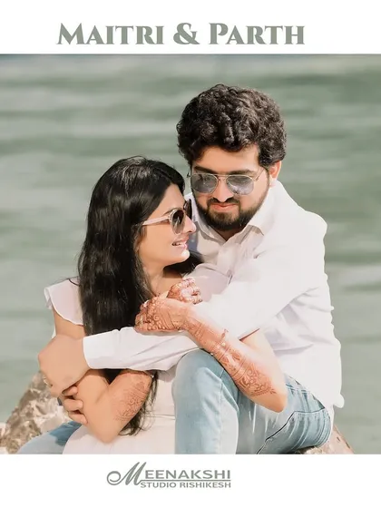 A sweet and intimate pre-wedding portrait of a couple embracing by the river. This shot focuses on their close connection and the beautiful Rishikesh scenery.