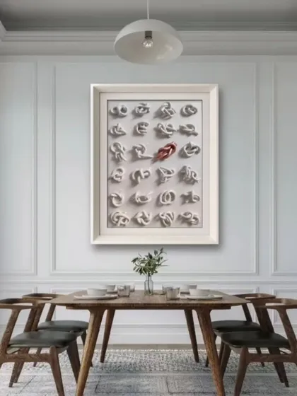 My 'KNOTS' artwork, seen here in a client's dining room, uses 3D knots to symbolize personal challenges. The single colored knot represents the one issue we are actively working to untangle, showing that growth is a gradual process of self-improvement.