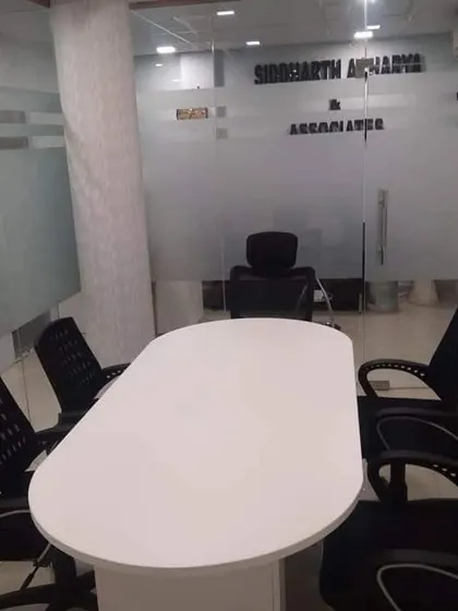 The conference room at my office on Asaf Ali Road, New Delhi. This space is designed for client meetings and team strategy sessions.