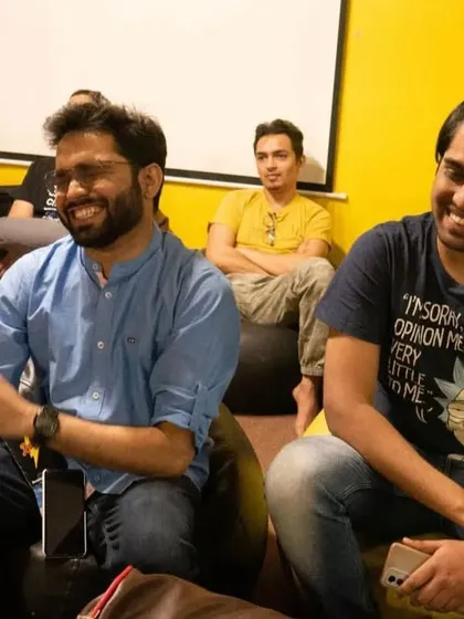 The audience enjoys a good laugh at our comedy open mic. The bean bags and relaxed setting make it feel like you're hanging out with friends.
