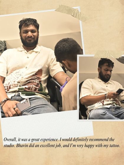 "Overall, it was a great experience. I would definitely recommend the studio." A relaxed and happy client during his tattoo session.