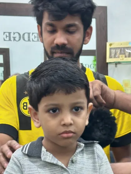Even my youngest patrons get the full professional treatment. I take extra care to make sure kids are comfortable and happy during their haircut.
