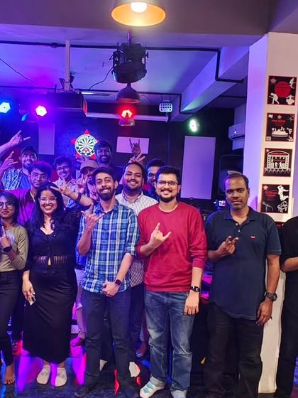 The crew from another packed house, all throwing up the rock sign. The energy is always high here.