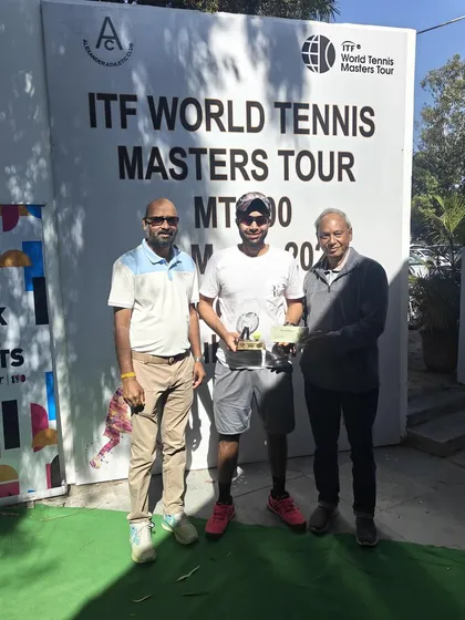 Posing with our trophies and tournament officials after a successful ITF World Tennis Masters Tour event.