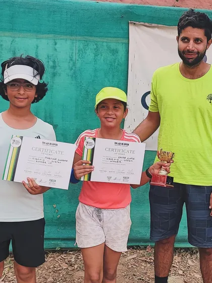 A coach with his two winning students. We are proud of their progress and achievements.
