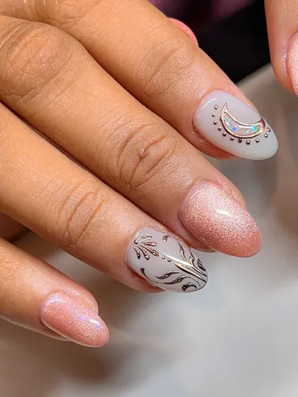 Cat eye has won everyone's heart, but look at my moon shine like an opal. This design combines a shimmery pink cat eye with detailed celestial art.