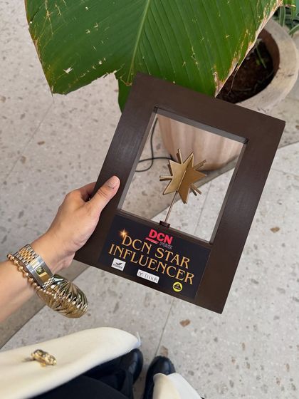 A close-up of my DCN Star Influencer award. This recognition for my work in fashion and styling fuels my passion to keep creating, keep inspiring, and keep chasing my dreams.