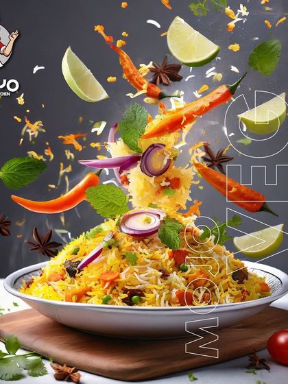 A plate of my delicious Veg Biryani. You can see the fresh ingredients like carrots, peas, and mint leaves mixed with the long-grain rice.