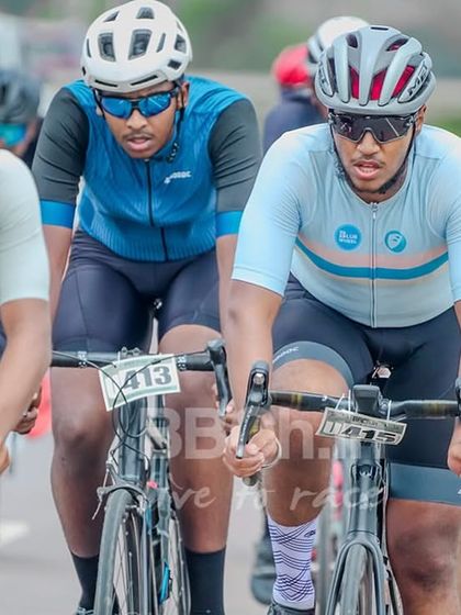 The intensity is written on the faces of these riders as they maintain a high pace. Every cyclist here has trained hard for this moment.
