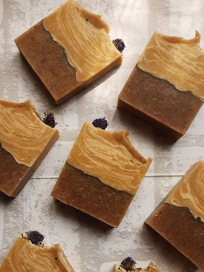 My Carrot Turmeric soap bars, made with real carrots, wild turmeric, and homemade coconut milk. The two-tone design is inspired by the natural colors of the ingredients.