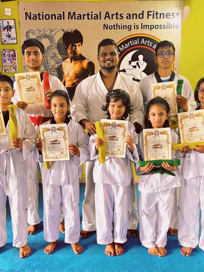 National Martial Arts and Fitness Academy - Kids Martial Arts & Fitness The Journey of Discipline: Belt Graduations photo 5