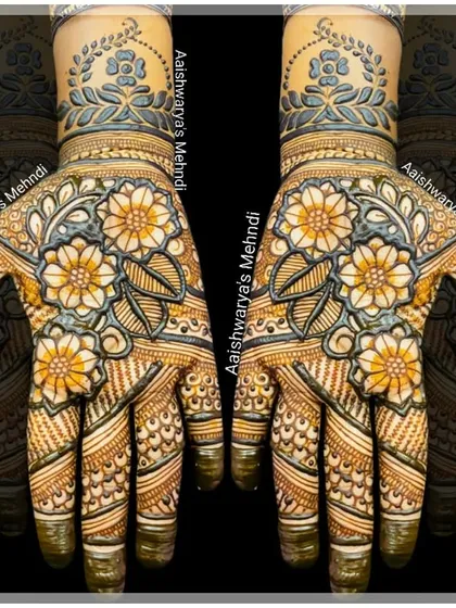 A stunning floral design with bold, colorful flowers on the palms. The use of shading gives the flowers a beautiful, three-dimensional effect.