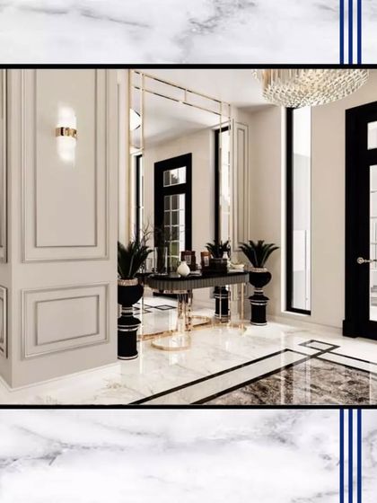 The entrance foyer of our homes is designed to impress. Here, a combination of black and white marble flooring, intricate wall panels, and elegant furniture creates a luxurious and welcoming first impression.