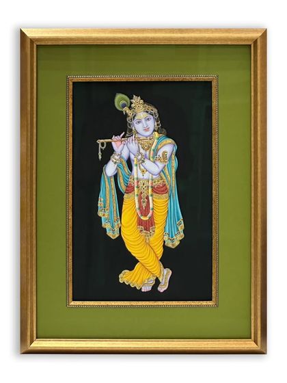 Here is the final look of the beautiful Krishna Bhagwan artwork. We used a golden fillet, a forest green mat, and an antique gold frame to give the piece the prominence it deserves. The use of museum glass ensures the colors remain vibrant.