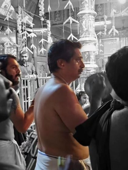 A moment of quiet focus from an Ilathalam artist amidst the thunderous sound of the Melam at Ulsoor Ayyappan Temple.