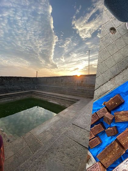 Recent atmospheres, past and present. A sunset over a historic stepwell.
