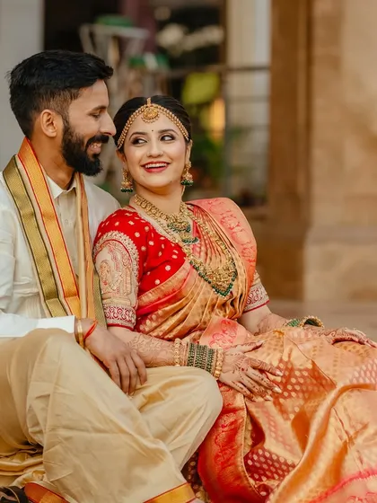 Creating looks that are perfect not just in person, but in photos too. This happy couple portrait shows how the makeup looks beautiful and natural in professional wedding photography.