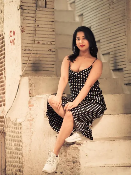 A slightly different angle from the steps, this time with a more direct and engaging expression. It shows how small changes in posing can alter the mood of the photo.