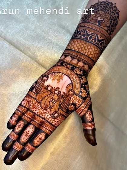 A single-hand design focused on a doli (palanquin) motif, symbolizing the bride's journey. The wristband features a peacock and detailed patterns.