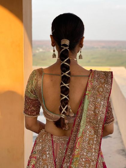 A close up of the ribbon wrapped braid. This is a simple yet very effective way to add a unique touch to a bridal hairstyle.