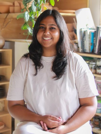 A portrait of Shwetha Sundar, the creator of the 'Moments Together' collection, a testament to her perseverance and hard work.