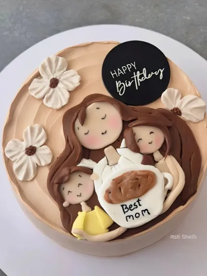 A special cake for "Best Mom" featuring a custom fondant topper. This is my seasonal Mango Coconut Vanilla cake.