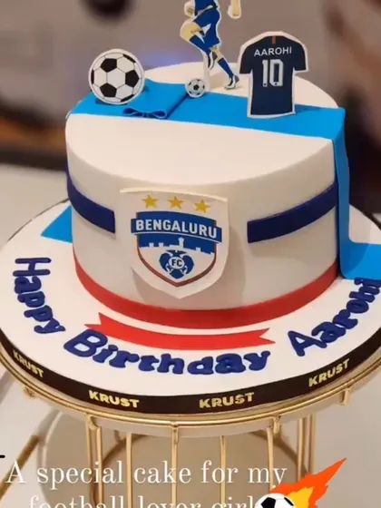 A special custom cake for a Bengaluru FC football fan. The design incorporates the team's logo and colours, along with a personalized jersey and name, making it a truly unique celebration cake for a football lover.