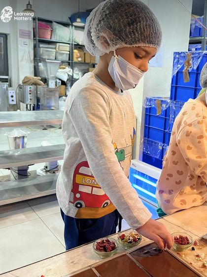 A delicious field trip to a chocolate factory. The children learned about the bean-to-bar process, engaged their senses of smell and taste, and even got to create their own chocolate bars, making for a memorable and educational day.