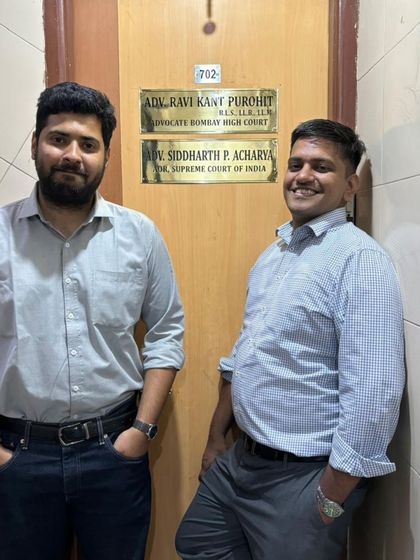 Standing outside our new office in Mumbai. The nameplate signifies our commitment to serving clients in both Delhi and Mumbai.