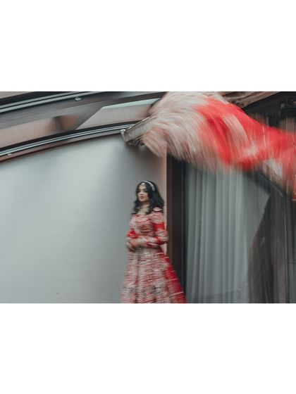 An artistic shot using motion blur to create a sense of dreaminess around the bride. I encourage creative photography to give you a unique set of wedding memories.