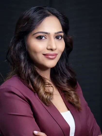 A professional business portrait. This clean, well-lit headshot is perfect for corporate profiles, actors, or anyone needing a polished and confident look.