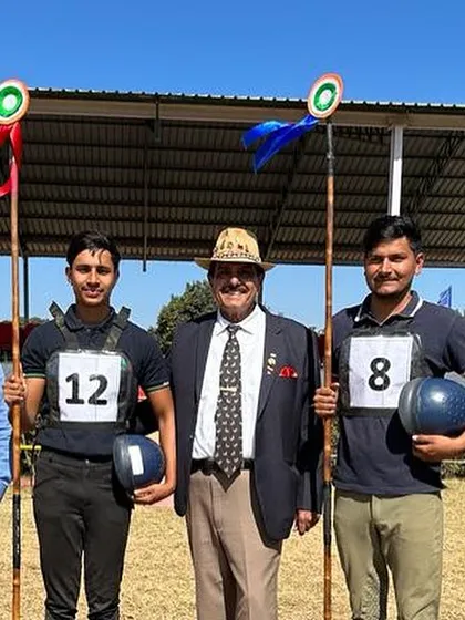 Our riders standing with officials and military personnel, showcasing the formal and disciplined nature of competitive equestrian sports.