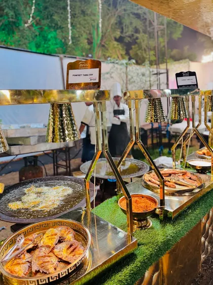 The complete live tawa fry station, offering both Pomfret and other fish varieties, fried to order.