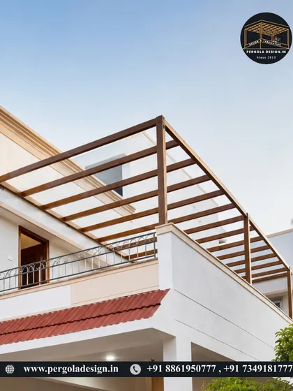 The completed terrace pergola, now with a glass roof installed on the wood-finish aluminum frame, creating a sleek and modern look.