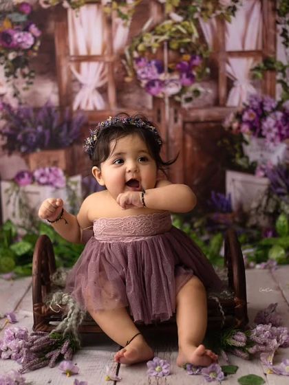 Every little expression is so precious. This darling was an absolute dream to photograph, and her personality shines in this lavender-themed setup.