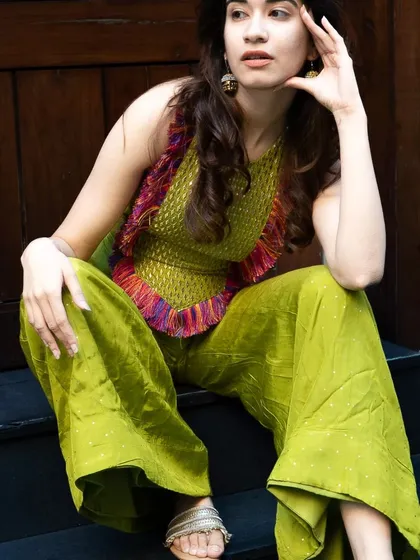 A full-length seated pose on outdoor steps, but still part of the cafe's environment. This shows how I utilize all aspects of a location to get a variety of shots.