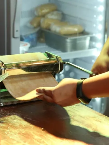 Our live pasta station is an immersive experience. We bring the heart of an Italian kitchen to your event, with our chefs rolling fresh pasta dough by hand, demonstrating the craft and ensuring every plate is made to order.