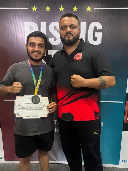 Me with Vraj after he fought with heart and went the distance. Even without a win, his journey is far from over, and his team is right behind him.