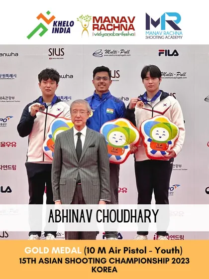 A moment of international glory. Abhinav Choudhary on the podium at the 15th Asian Shooting Championship in Korea, flanked by competitors, after securing the Gold Medal in the 10m Air Pistol Youth Men category.