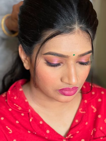 A detailed shot of the eye makeup before the final styling, showing the precision of the application.