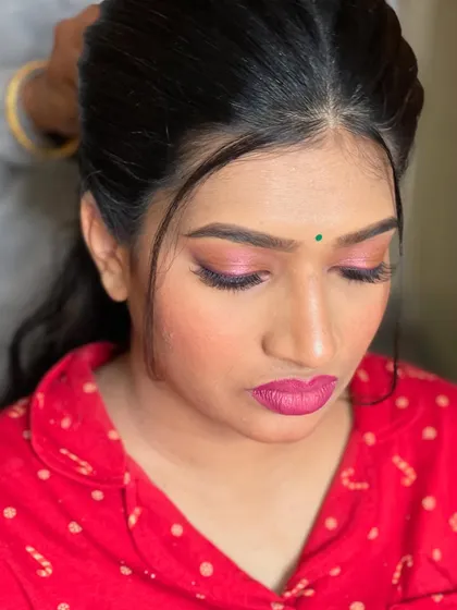 A detailed shot of the eye makeup before the final styling, showing the precision of the application.