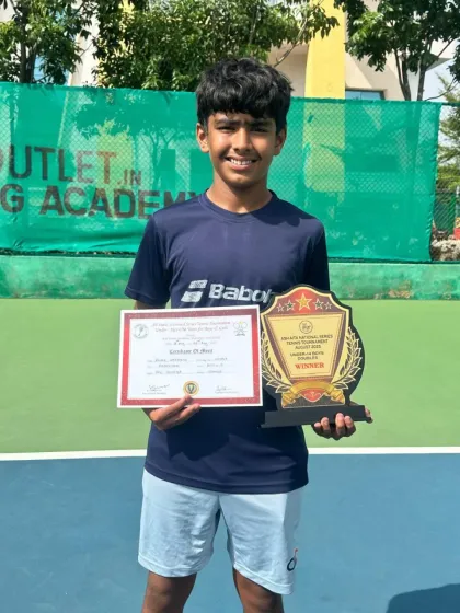 The result of dedication. Our student-athlete Ronak Hariyani proudly displays his winner's trophy and certificate after a victory in the Under-14 National Series tennis tournament.