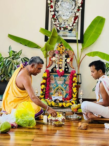 Performing the Ganapathi, Navagraha, and Lakshmi pooja during our anniversary celebration. We begin every important event by invoking the divine, seeking blessings to guide us and give us the strength to evolve and transform our lives.