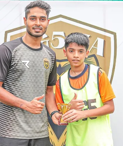 A coach presents a Player of the Match award, a regular feature in our tournaments to acknowledge game-changing contributions.