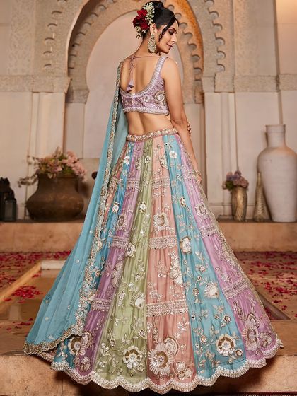 A back view of the pastel panelled lehenga, showcasing its beautiful design and flow.